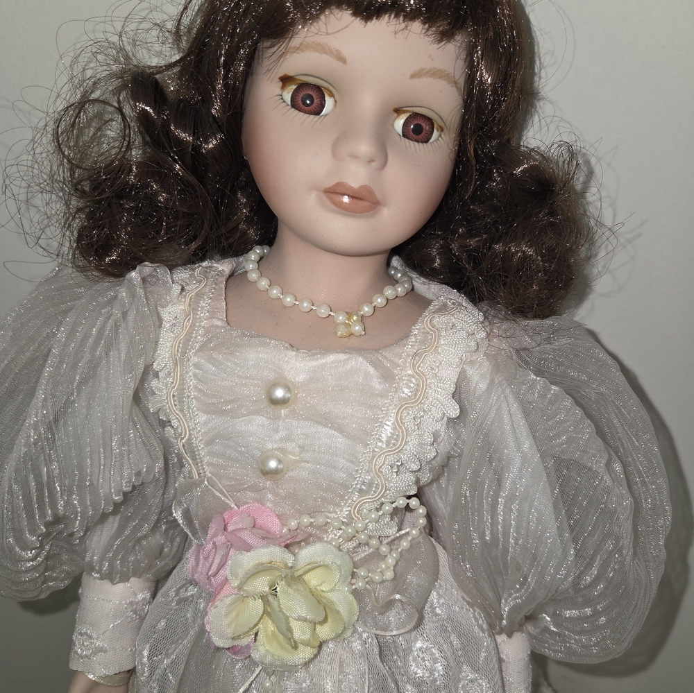 Elegant Porcelain Doll with Brown Hair